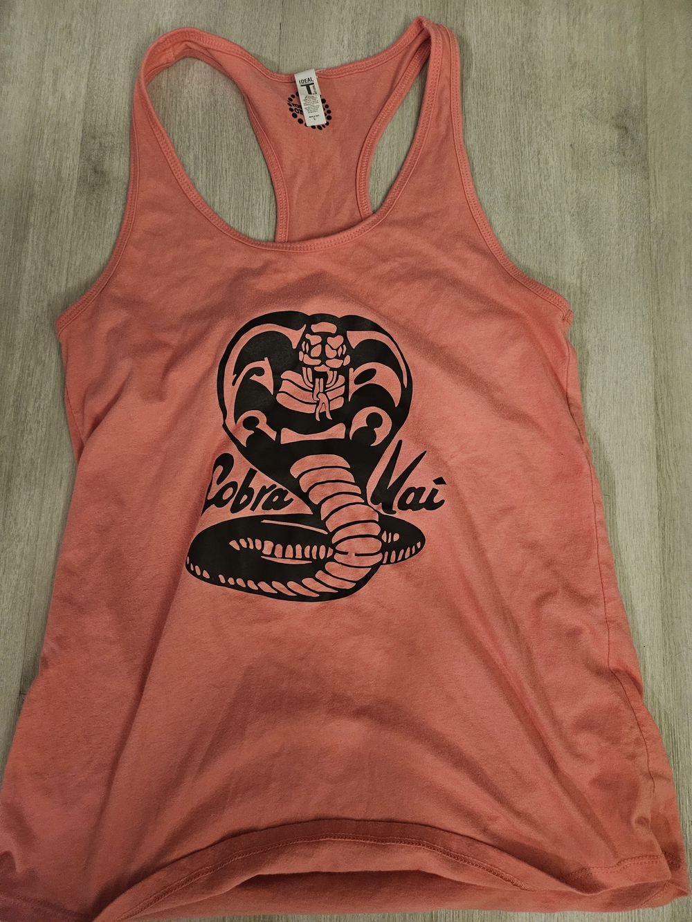 Next Level Apparel Coral Racerback Tank with Black Cobra Graphic